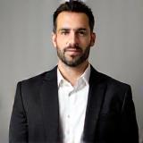 Portrait of Restaurant Manager Luca Moretti.